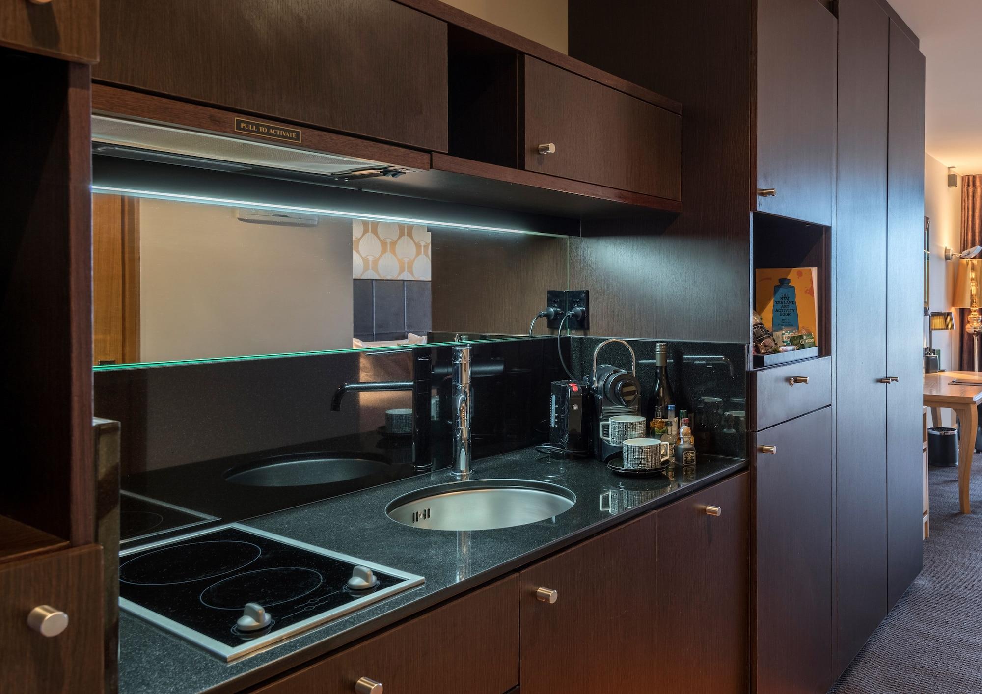 Museum Apartment Hotel, Independent Collection By Evt Веллингтон Экстерьер фото A kitchen in a serviced apartment